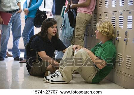 Students by lockers in corridor View Large Photo Image Stock Photo - Students by lockers in corridor. Fotosearch