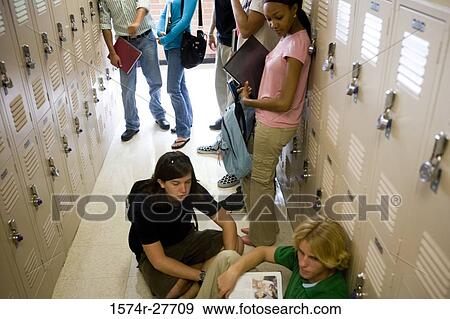 Students by lockers in corridor View Large Photo Image Stock Photo - Students by lockers in corridor. Fotosearch