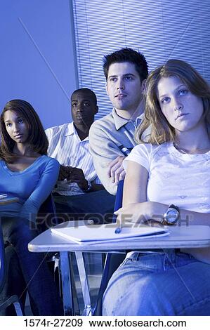 University students attending lecture in the classroom View Large Photo Image Stock Photo - University students attending lecture in the classroom. Fotosearch