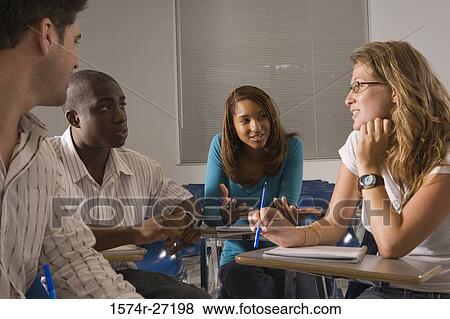 University students in discussion in the classroom View Large Photo Image Stock Photo - University students in discussion in the classroom. Fotosearch