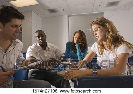 University students in discussion in the classroom View Large Photo Image Stock Photograph - University students in discussion in the classroom. Fotosearch