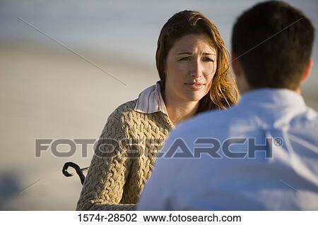 Woman with her husband on the beach View Large Photo Image Stock Image - Woman with her husband on the beach. Fotosearch