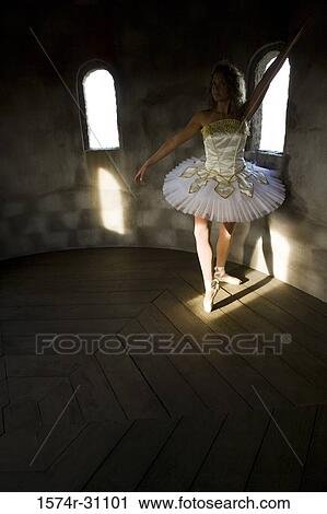 Young woman practicing ballet dancing View Large Photo Image Stock Image - Young woman practicing ballet dancing. Fotosearch