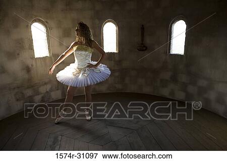 Young woman practicing ballet dancing View Large Photo Image Stock Photo - Young woman practicing ballet dancing. Fotosearch