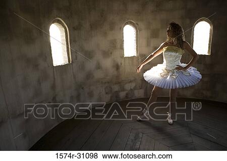 Young woman practicing ballet dancing View Large Photo Image Stock Photo - Young woman practicing ballet dancing. Fotosearch