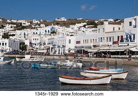 Stock Photo - Boats moored at a harbor, Mykonos Town, Mykonos, Cyclades Islands, Greece. Fotosearch