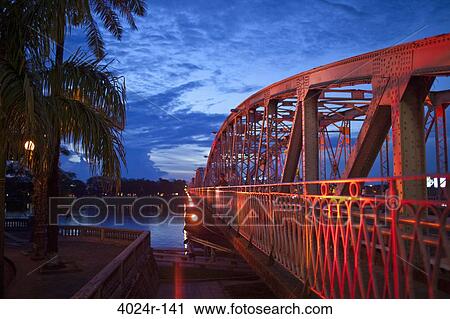 Bridge lit up at dusk, Trang Tien Bridge, Perfume River, Hue, Vietnam View Large Photo Image Stock Image - Bridge lit up at dusk, Trang Tien Bridge, Perfume River, Hue, Vietnam. Fotosearch