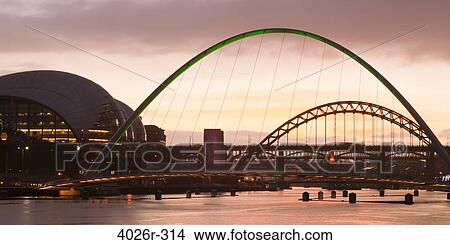 Bridge over a river, Gateshead Millennium Bridge, Tyne River, Newcastle-upon-Tyne, Northumberland, England View Large Photo Image Picture - Bridge over a river, Gateshead Millennium Bridge, Tyne River, Newcastle-upon-Tyne, Northumberland, England. Fotosearch