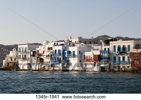 Buildings at the waterfront, Little Venice, Mykonos Town, Mykonos, Cyclades Islands, Greece View Large Photo Image Stock Image - Buildings at the waterfront, Little Venice, Mykonos Town, Mykonos, Cyclades Islands, Greece. Fotosearch