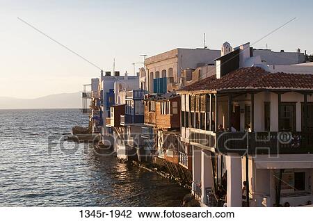 Buildings at the waterfront, Little Venice, Mykonos Town, Mykonos, Cyclades Islands, Greece View Large Photo Image Stock Image - Buildings at the waterfront, Little Venice, Mykonos Town, Mykonos, Cyclades Islands, Greece. Fotosearch