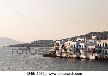 Buildings at the waterfront, Little Venice, Mykonos Town, Mykonos, Cyclades Islands, Greece View Large Photo Image Stock Image - Buildings at the waterfront, Little Venice, Mykonos Town, Mykonos, Cyclades Islands, Greece. Fotosearch