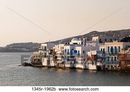 Buildings at the waterfront, Little Venice, Mykonos Town, Mykonos, Cyclades Islands, Greece View Large Photo Image Stock Image - Buildings at the waterfront, Little Venice, Mykonos Town, Mykonos, Cyclades Islands, Greece. Fotosearch
