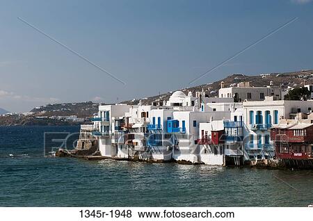 Stock Photo - Buildings at the waterfront, Little Venice, Mykonos Town, Mykonos, Cyclades Islands, Greece. Fotosearch