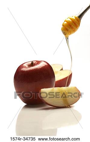 Close-up of apples with a honey dipper View Large Photo Image Stock Photography - Close-up of apples with a honey dipper. Fotosearch