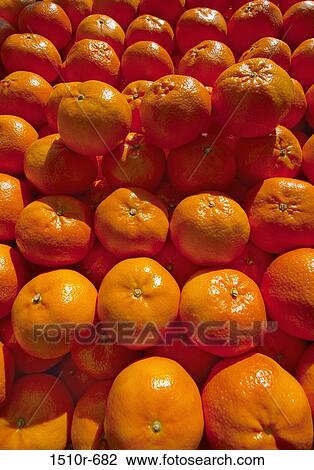 Close-up of oranges at a market stall View Large Photo Image Stock Image - Close-up of oranges at a market stall. Fotosearch