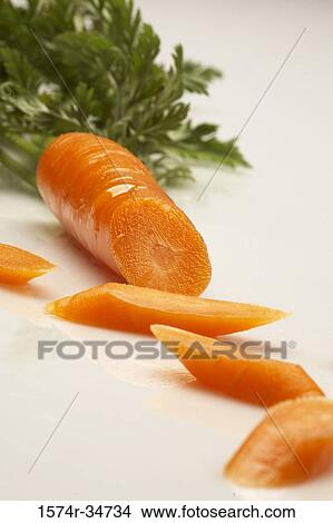 Close-up of slices of a carrot View Large Photo Image Picture - Close-up of slices of a carrot. Fotosearch