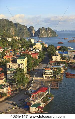 Coastal city with cliffs viewed from Bai Chay Bridge, Halong Bay, Vietnam View Large Photo Image Stock Photo - Coastal city with cliffs viewed from Bai Chay Bridge, Halong Bay, Vietnam. Fotosearch