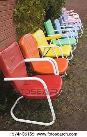 Colorful chairs outside of a farmhouse, Rasmussen Farms, Oregon, USA View Large Photo Image Stock Photography - Colorful chairs outside of a farmhouse, Rasmussen Farms, Oregon, USA. Fotosearch
