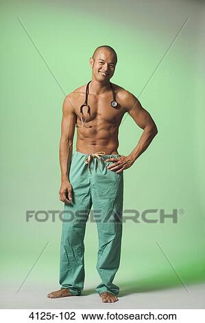 Doctor smiling shirtless View Large Photo Image Stock Image - Doctor smiling shirtless. Fotosearch