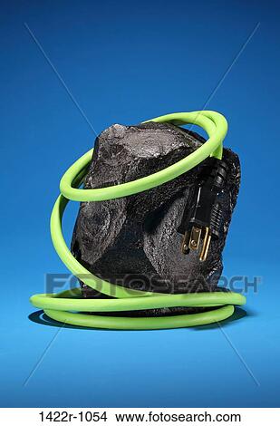 Electrical cord wrapped on a black coal View Large Photo Image Picture - Electrical cord wrapped on a black coal. Fotosearch