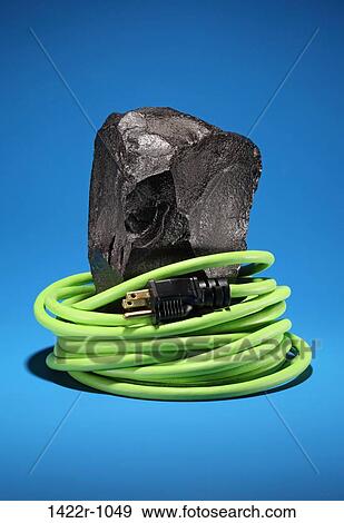 Electrical cord wrapped on a black coal View Large Photo Image Stock Photo - Electrical cord wrapped on a black coal. Fotosearch