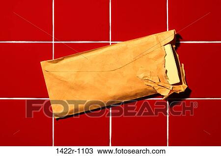 Stock Image - High angle view of a used and opened postage envelope. Fotosearch