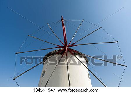 Low angle view of a traditional windmill, Mykonos Town, Mykonos, Cyclades Islands, Greece View Large Photo Image Stock Photo - Low angle view of a traditional windmill, Mykonos Town, Mykonos, Cyclades Islands, Greece. Fotosearch