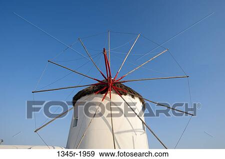 Stock Photo - Low angle view of a traditional windmill, Mykonos Town, Mykonos, Cyclades Islands, Greece. Fotosearch