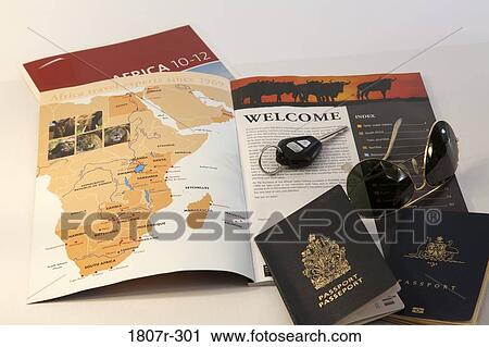 Map and car key with two passports View Large Photo Image Stock Image - Map and car key with two passports. Fotosearch