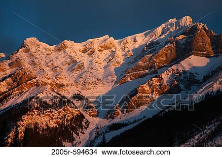 Morning lights falling on snow covered mountains, Cascade Mountain, Banf National Park, Alberta, Canada View Large Photo Image Picture - Morning lights falling on snow covered mountains, Cascade Mountain, Banf National Park, Alberta, Canada. Fotosearch