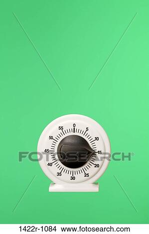 Plastic timer on a green background View Large Photo Image Picture - Plastic timer on a green background. Fotosearch