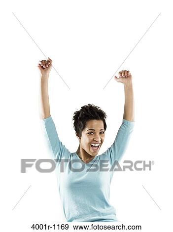 Stock Photo - Portrait of a mid adult woman laughing. Fotosearch