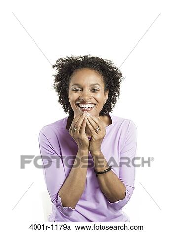 Portrait of a mid adult woman smiling View Large Photo Image Stock Image - Portrait of a mid adult woman smiling. Fotosearch
