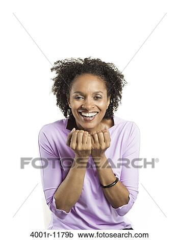 Portrait of a mid adult woman smiling View Large Photo Image Stock Image - Portrait of a mid adult woman smiling. Fotosearch