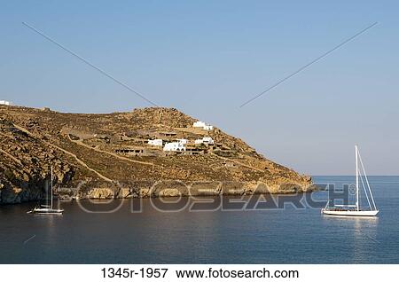 Sailboats in the sea, Super Paradise Beach, Mykonos, Cyclades Islands, Greece View Large Photo Image Stock Photo - Sailboats in the sea, Super Paradise Beach, Mykonos, Cyclades Islands, Greece. Fotosearch