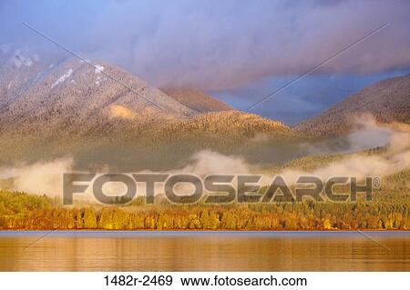 Sea with mountain range in the background, Hood Canal, Seabeck, Kitsap County, Washington State, USA View Large Photo Image Stock Photo - Sea with mountain range in the background, Hood Canal, Seabeck, Kitsap County, Washington State, USA. Fotosearch