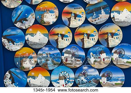 Souvenir tondo at a market stall, Mykonos Town, Mykonos, Cyclades Islands, Greece View Large Photo Image Picture - Souvenir tondo at a market stall, Mykonos Town, Mykonos, Cyclades Islands, Greece. Fotosearch