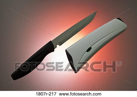 Studio shot of self sharpening knife View Large Photo Image Stock Photo - Studio shot of self sharpening knife. Fotosearch
