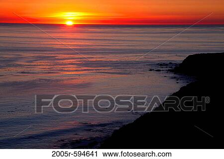 Sunset over the ocean near Gamboa Point, Big Sur, California, USA View Large Photo Image Stock Image - Sunset over the ocean near Gamboa Point, Big Sur, California, USA. Fotosearch