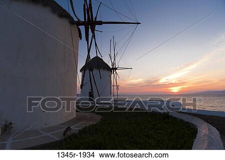 Traditional windmill at sunset, Mykonos Town, Mykonos, Cyclades Islands, Greece View Large Photo Image Picture - Traditional windmill at sunset, Mykonos Town, Mykonos, Cyclades Islands, Greece. Fotosearch