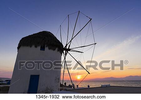 Traditional windmill at sunset, Mykonos Town, Mykonos, Cyclades Islands, Greece View Large Photo Image Stock Image - Traditional windmill at sunset, Mykonos Town, Mykonos, Cyclades Islands, Greece. Fotosearch