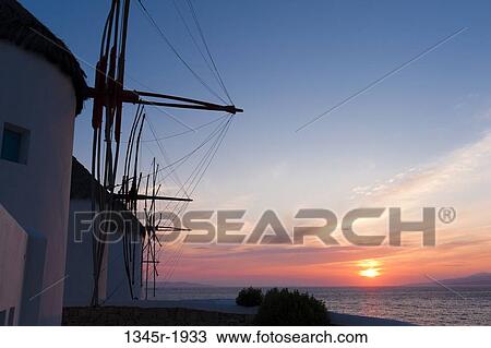 Traditional windmill at sunset, Mykonos Town, Mykonos, Cyclades Islands, Greece View Large Photo Image Stock Image - Traditional windmill at sunset, Mykonos Town, Mykonos, Cyclades Islands, Greece. Fotosearch