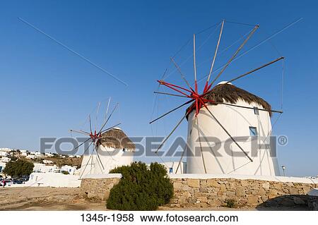 Traditional windmill on a hill, Mykonos Town, Mykonos, Cyclades Islands, Greece View Large Photo Image Stock Photo - Traditional windmill on a hill, Mykonos Town, Mykonos, Cyclades Islands, Greece. Fotosearch