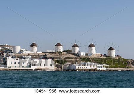 Traditional windmill on a hill, Mykonos Town, Mykonos, Cyclades Islands, Greece View Large Photo Image Stock Photograph - Traditional windmill on a hill, Mykonos Town, Mykonos, Cyclades Islands, Greece. Fotosearch