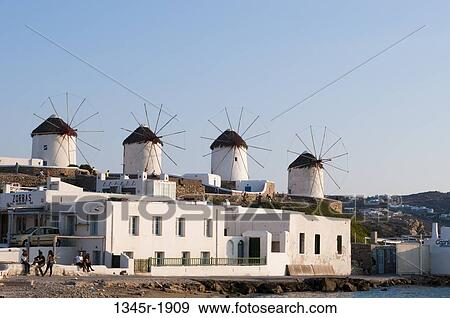 Windmills in a town, Mykonos Town, Mykonos, Cyclades Islands, Greece View Large Photo Image Stock Photo - Windmills in a town, Mykonos Town, Mykonos, Cyclades Islands, Greece. Fotosearch