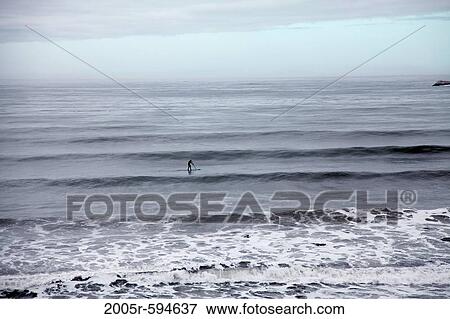 Stock Photo - Windsurfer in the ocean, Pismo Beach, California, USA. Fotosearch