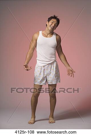 Stock Photo - Young man smiling. Fotosearch