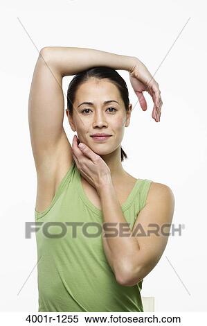 Young woman posing and smiling View Large Photo Image Stock Photography - Young woman posing and smiling. Fotosearch