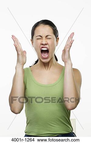 Young woman screaming View Large Photo Image Picture - Young woman screaming. Fotosearch