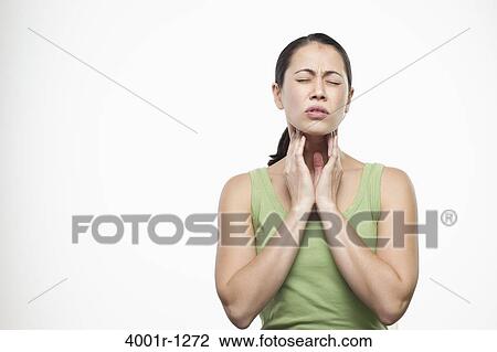 Young woman suffering with neck pain View Large Photo Image Stock Image - Young woman suffering with neck pain. Fotosearch